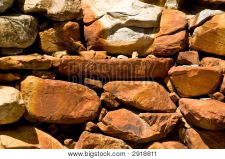 Red Rocks In Landscaped Wall