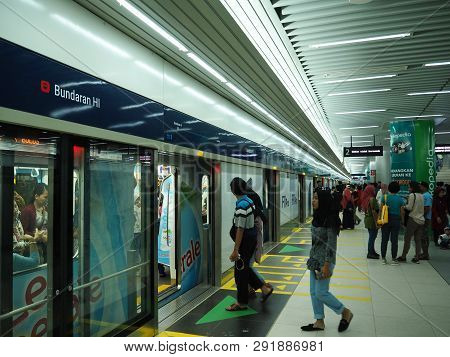 Jakarta, Indonesia - March 23, 2019: People Getting On The Train At Bundaran Hi Mrt Station.
