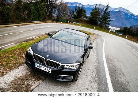 Auvergne-rhone-alpes, France - March 9, 2019: Motor Car Bmw 520d (g30) At The Narrow Alpine Road.