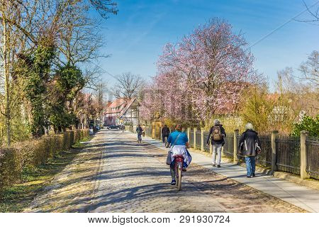 Rheda-wiedenbruck, Germany - March 22, 2019: People Walking And Cycling In The Historic City Rheda, 