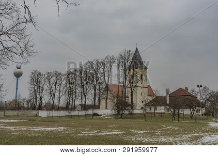 Lomnice Nad Luznici Old Town With Church In Cold Dark Winter Day