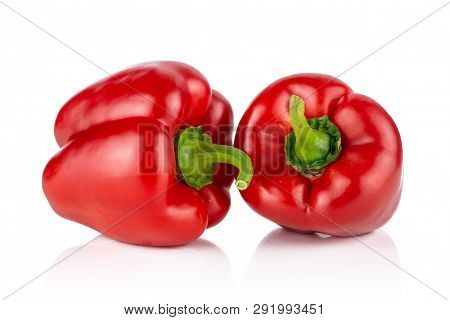 Group Of Two Whole Bulgarian Red Bell Pepper Isolated On White Background