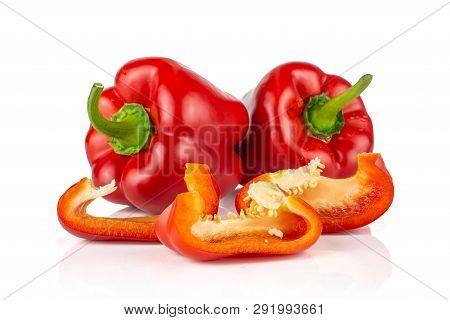 Group Of Two Whole Three Slices Of Bulgarian Red Bell Pepper Isolated On White Background