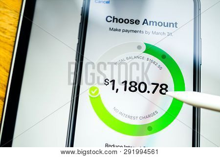 Paris, France - Mar 27, 2019: Man Pov At Ipad Pro Tablet Reading On Apple.com Website About New Appl