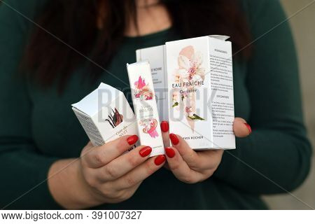 Young Girl Holds Yves Rocher Production In Packages. Yves Rocher Is A Worldwide Cosmetics And Beauty