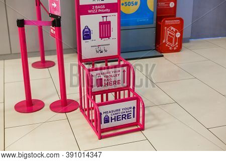 Kiev, Ukraine - Dec 31, 2019: Wizzair Metallic Carry On Luggage Sizer