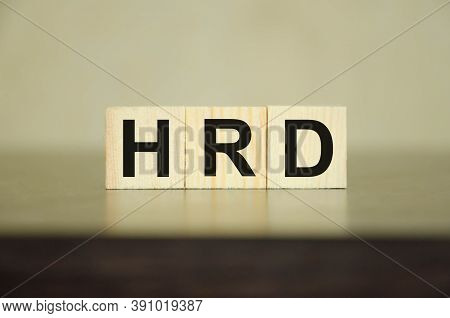 Hrd Word Written On A Wooden Block. Hrd Text On Table, Concept.
