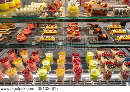 Assortment Of Pastries And Cakes In Patisserie Display