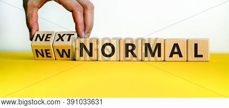 Hand Is Turning Cubes And Changes The Words 'new Normal' To 'next Normal'. Covid-19 Postpandemic Con