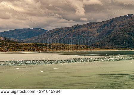 Sarmiento Channel, Chile - December 11, 2008: Just Down Amalia Glacier, Stream Of Floating Ice Piece