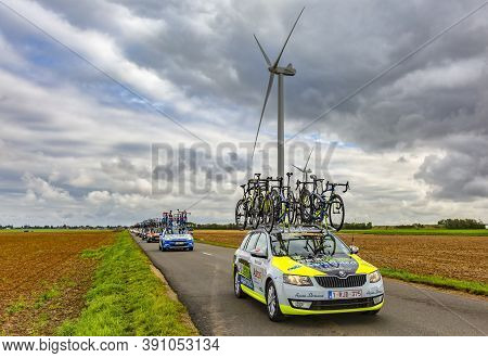 Le Gault-saint-denis, France - October 08, 2017: Row Of Technical Vehicles Driving On A Road In The 