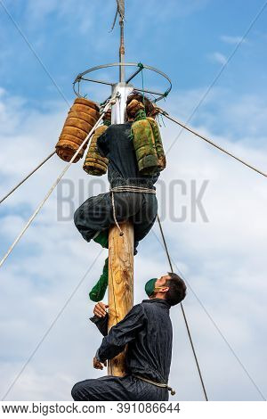 Verona, Italy - Sept 20, 2020: Albero Or Palo Della Cuccagna, Climbing The Greasy Pole Of Cockaigne.
