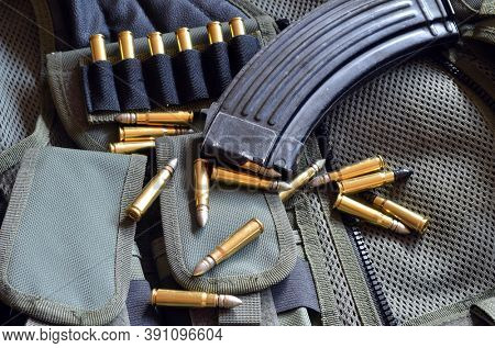 Ammunition 7,62*39.Tactical unloading vest as background. October 23, 2020.Kiev,Ukraine