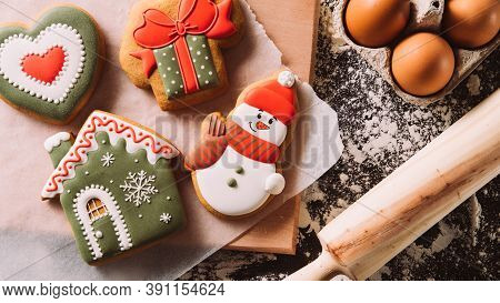Festive Decorated Bakery. Christmas Tradition. Homemade Biscuits. Figured Gingerbread Icing Cookies 
