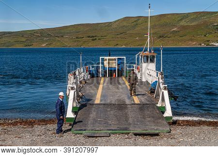Punta Arenas, Chile - December 12, 2008: Green-white Ferry Sits On Blue Water Otway Sound,  Brunswic
