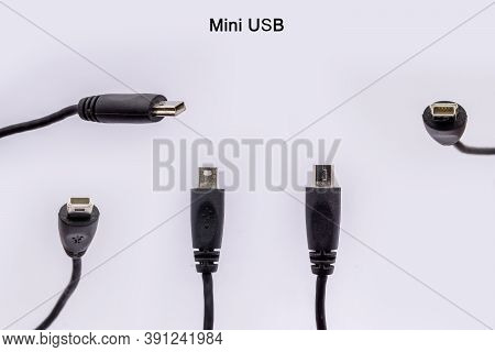 Mini Usb Cable From Different Angles Isolated Against White Background.