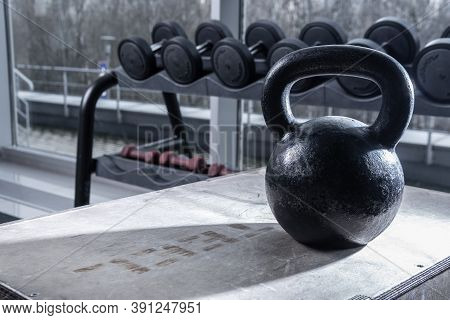Gira And Dumbbells At The Back, The Window Shines Bright Sun Plan Black Light Background Large On A 