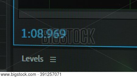 Timecode Blue Digits Change While Film Editor Processes Video Sequence In Program On Black Monitor M