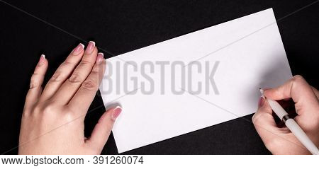 Female Hands Writing On White Paper With Vitage Pen With Copy Space