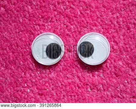 Funny Wiggle Google Eyes On Fabric Silly Fur Carpet Background