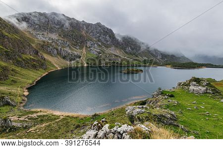 Lago Del Valle Lake In Somiedo National Park In Asturias, Spain On A Rainy Autumn Day. Scenic Autumn
