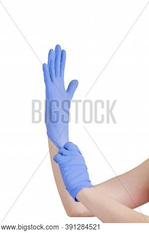 Doctor Puts On Medical Gloves. Covit-19 Coronavirus Pandemic