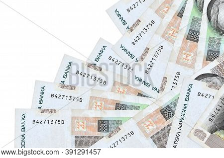 10 Croatian Kuna Bills Lies In Different Order Isolated On White. Local Banking Or Money Making Conc