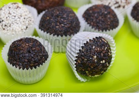 Dried Fruit And Nut Sweets. Some Are Sprinkled With Sesame Seeds. Made At Home In Self-isolation Dur