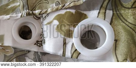 Plastic Rings For Attaching The Fabric To The Curtain Rod. White Plastic Organza Tulle Eyelets. Ligh