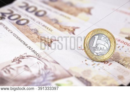 Currency Of One Real With Notes Of 200 Reais. Banknote Of Two Hundred Reais, Brazilian Economy, Infl