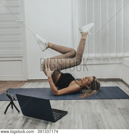Fitness Yoga coaching working from home - Personal training online stock photo