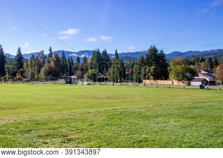 Cumberland Community Water Park At Sunny Day With Mountains In The Background