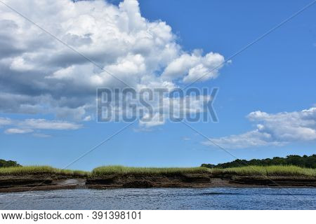 Beautiful River Landscape With A Marsh And Tidal River.