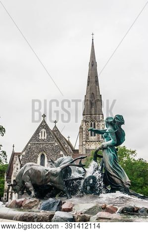Copenhagen /denmark, Jule 14 2019. St. Alban's Church And Gefion Fountain In Copenhagen, Denmark
