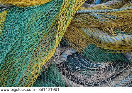 View On Fishermans Tackles And Nets Near Coastal Town Terracina, Latina, Italy On Sunset