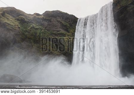 Scogafoss Waterfall In Iceland. Travel Summer Nordic Concept. Natural Icelandic Background.