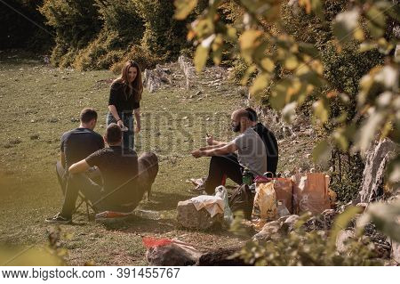 Split Croatia October 2020 A Group Of Friends Sitting In The Nature In A Green Field Of Rajcica Well