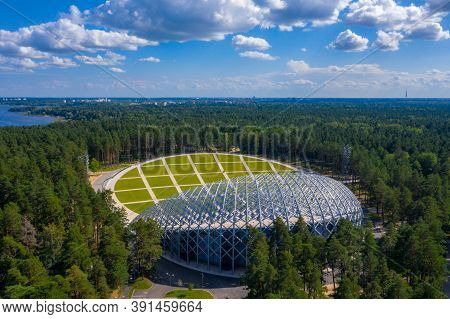 Riga, Latvia. August 10, 2020. Beautiful New Stadium Located In The Middle Of A Forest. Aerial View 