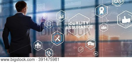 Qa Businessman Pressing Quality Assurance Button On Virtual Screens.