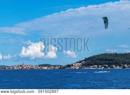 Viganj, Croatia - Jun 15, 2020: Unidentified Windsurfer At Viganj Beach With View At Korcula, Dalmat