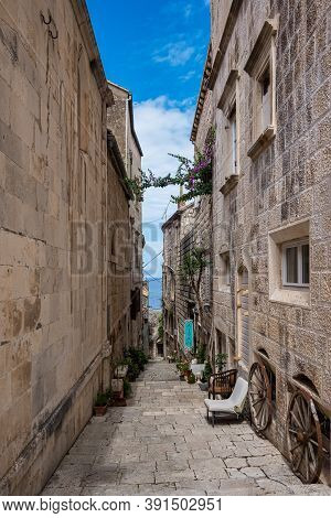 Korcula, Croatia - Jun 17, 2020: Narrow Street In Korcula Old Town, Croatia. Korcula Is A Historic F