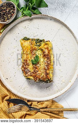 Cannelloni With Ricotta And Spinach. Italian Cuisine. Gray Background. Top View