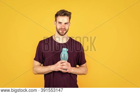 Helps Metabilize Food. Drinking Water. Handsome Young Man With Fit Body Drinking Fresh Water. Thirst