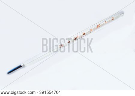 The Close-up Thermometer Isolated On White Background.