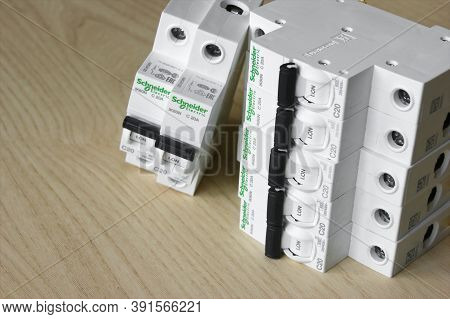 Kharkov, Ukraine - September 22, 2020 : Schneider Electric Circuit Breakers On Light Wood Background