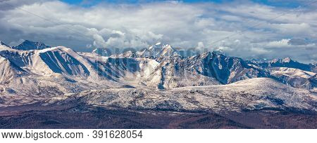 Scenic Panoramic Aerial View Of Snowy Mountain Peaks And Slopes Of North Chuyskiy Ridge. Beautiful C