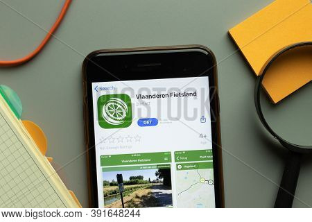 New York, Usa - 26 October 2020: Vlaanderen Fietsland Mobile App Logo On Phone Screen Close Up, Illu