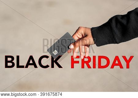 Shopping On Black Friday. Shoppoholic With Credit Card Ready For Black Friday Big Sales And Rush. Ad