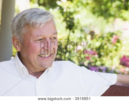 Senior Man Sitting Outdoors