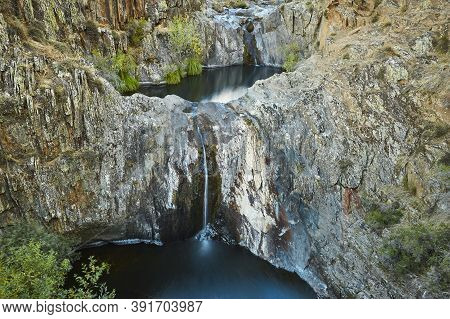 Dry Waterfall And Puddle Landscape In Roblelacasa Guadalajara, Spain